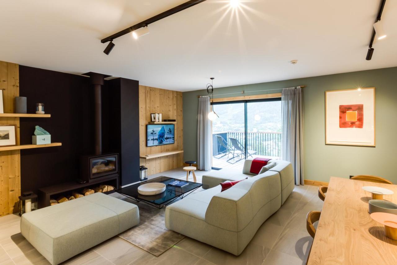 Le Chalet Mont Blanc เลอุชส์ ภายนอก รูปภาพ