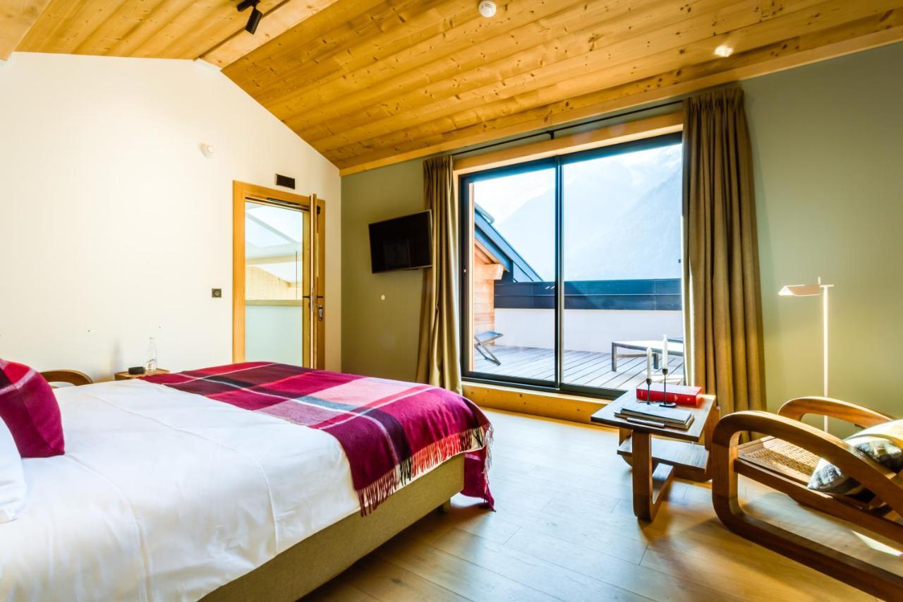 Le Chalet Mont Blanc เลอุชส์ ภายนอก รูปภาพ