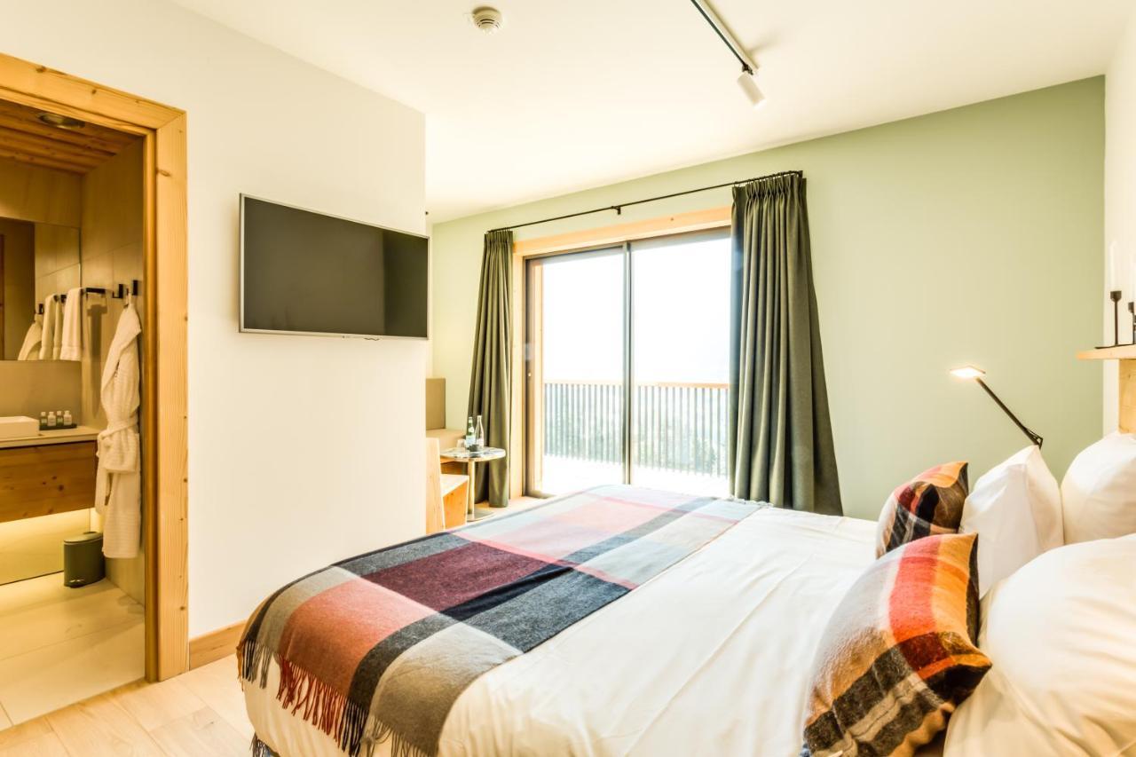 Le Chalet Mont Blanc เลอุชส์ ภายนอก รูปภาพ