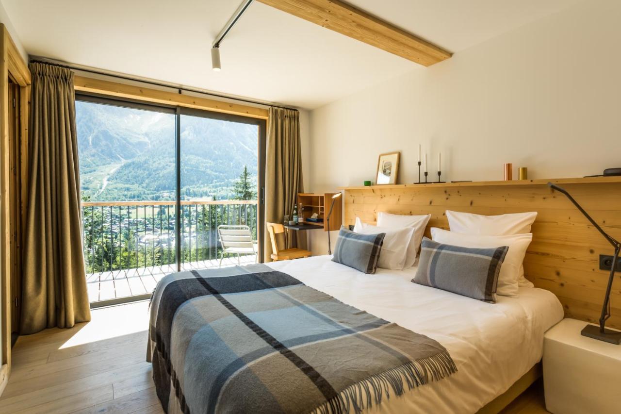 Le Chalet Mont Blanc เลอุชส์ ภายนอก รูปภาพ