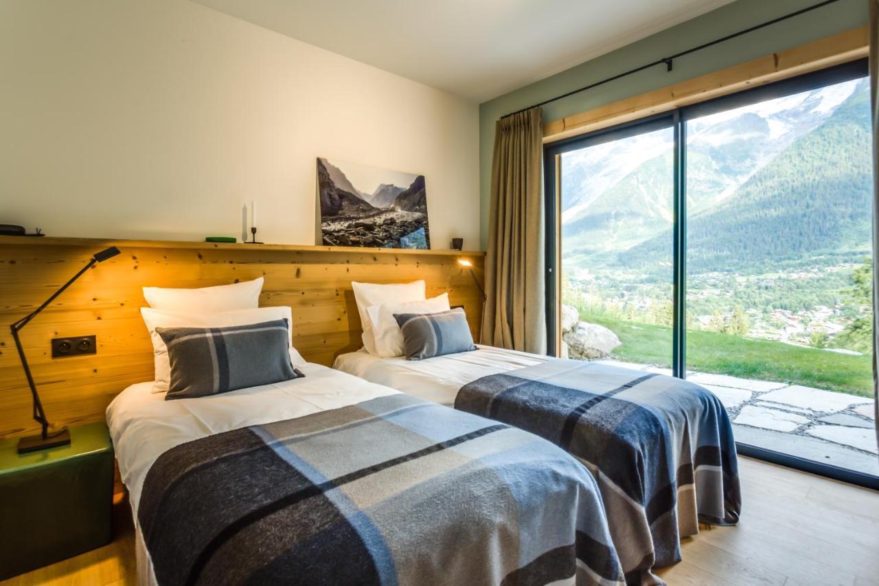 Le Chalet Mont Blanc เลอุชส์ ภายนอก รูปภาพ