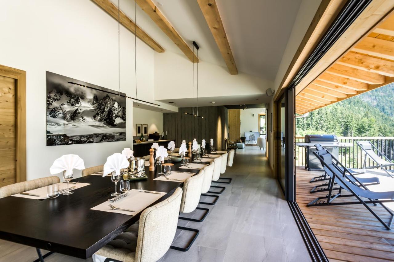Le Chalet Mont Blanc เลอุชส์ ภายนอก รูปภาพ