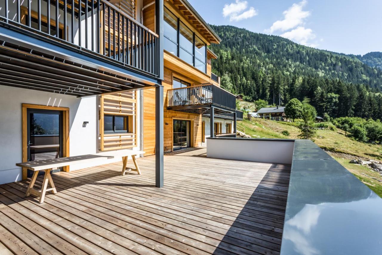 Le Chalet Mont Blanc เลอุชส์ ภายนอก รูปภาพ