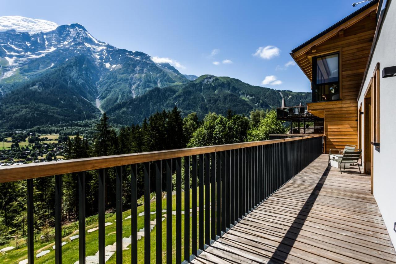 Le Chalet Mont Blanc เลอุชส์ ภายนอก รูปภาพ