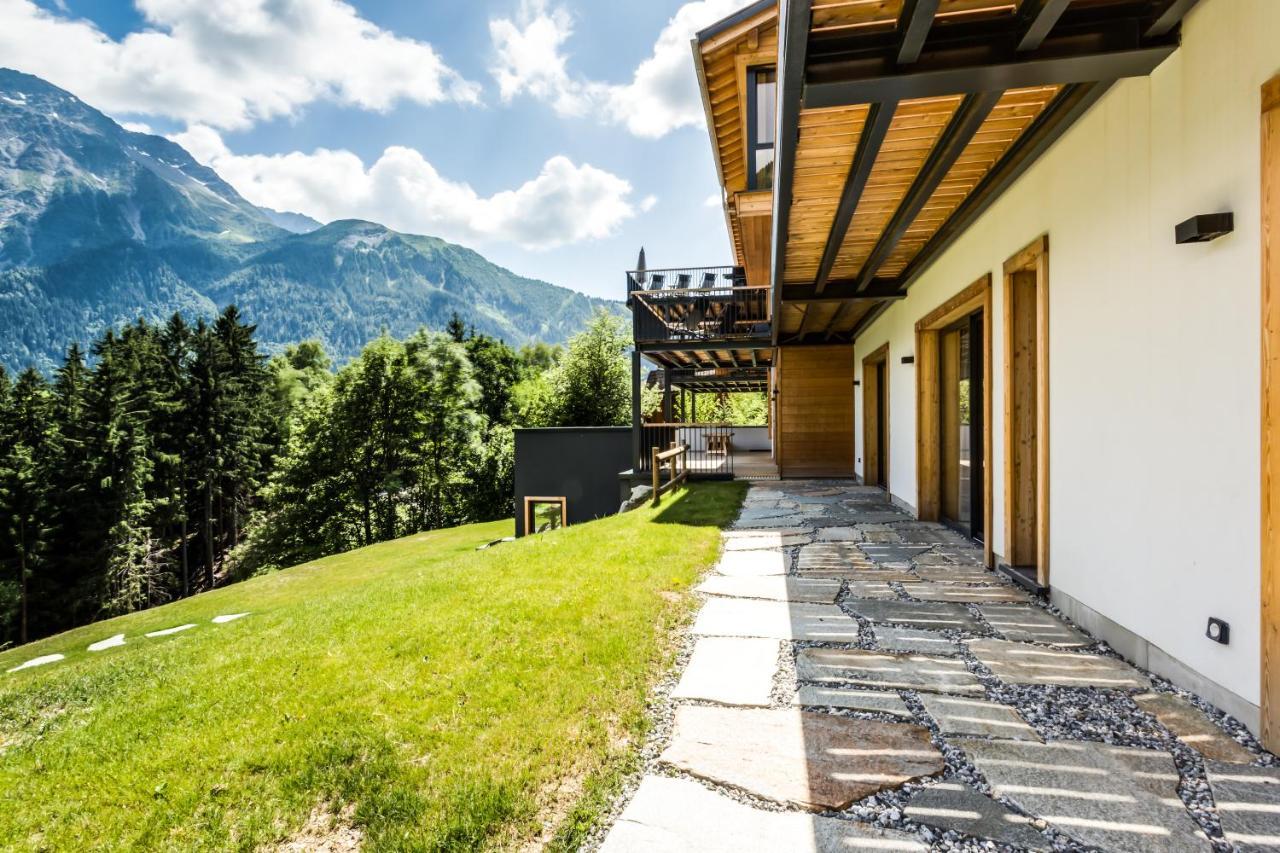 Le Chalet Mont Blanc เลอุชส์ ภายนอก รูปภาพ