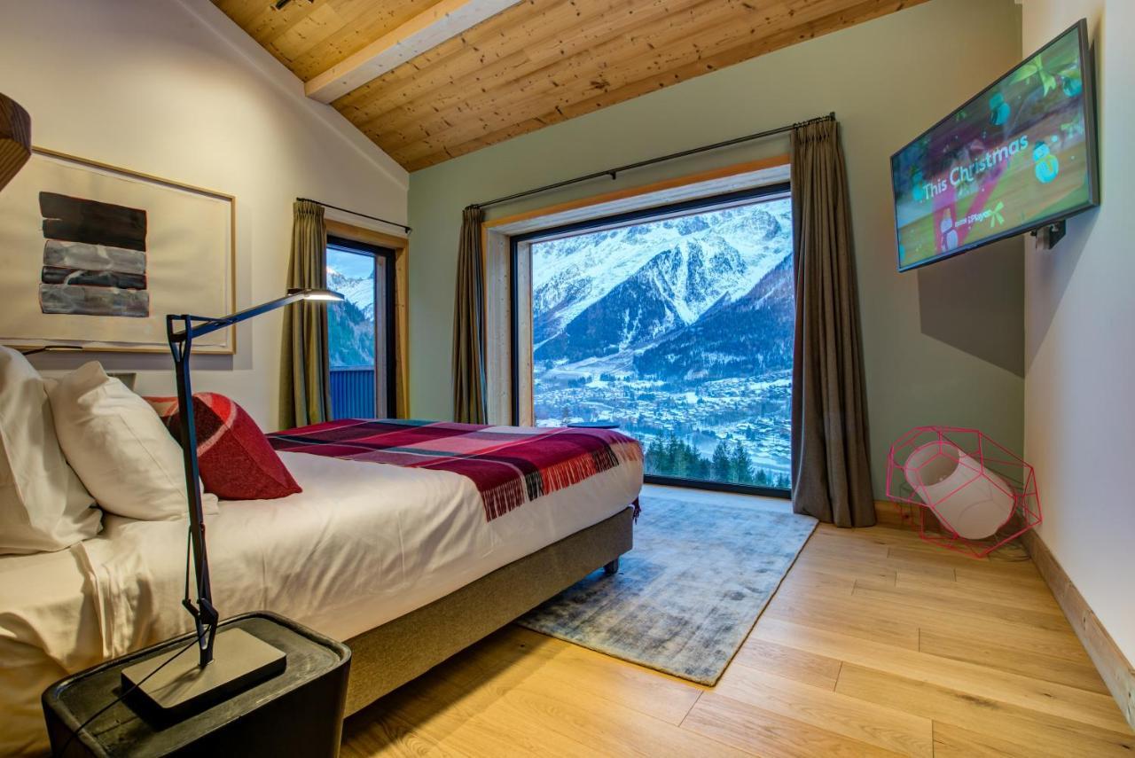 Le Chalet Mont Blanc เลอุชส์ ภายนอก รูปภาพ