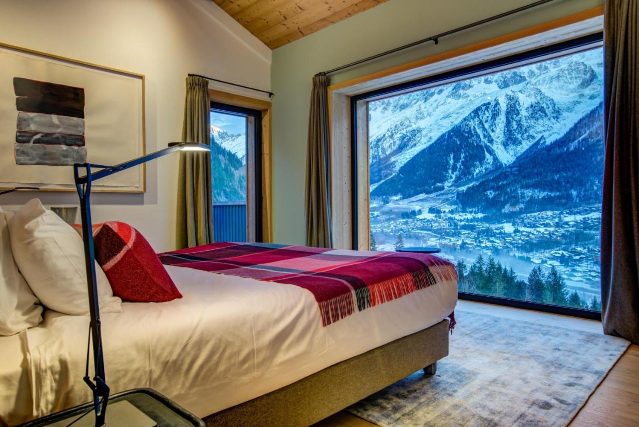 Le Chalet Mont Blanc เลอุชส์ ภายนอก รูปภาพ